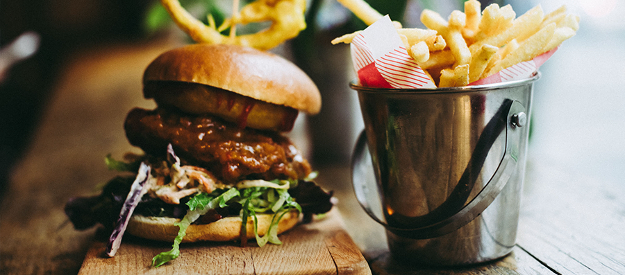 Burger and fries on a restaurant table