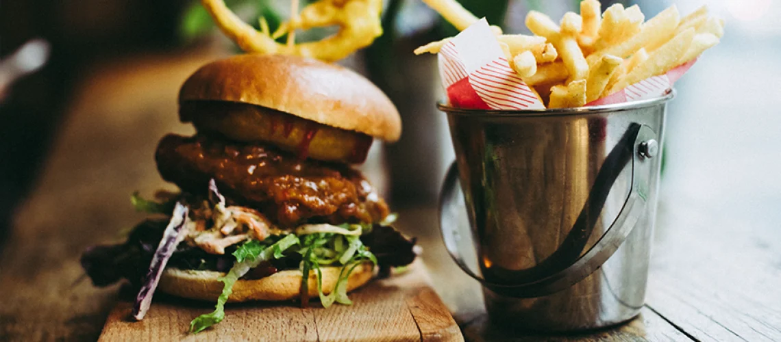 Burger and fries on a restaurant table